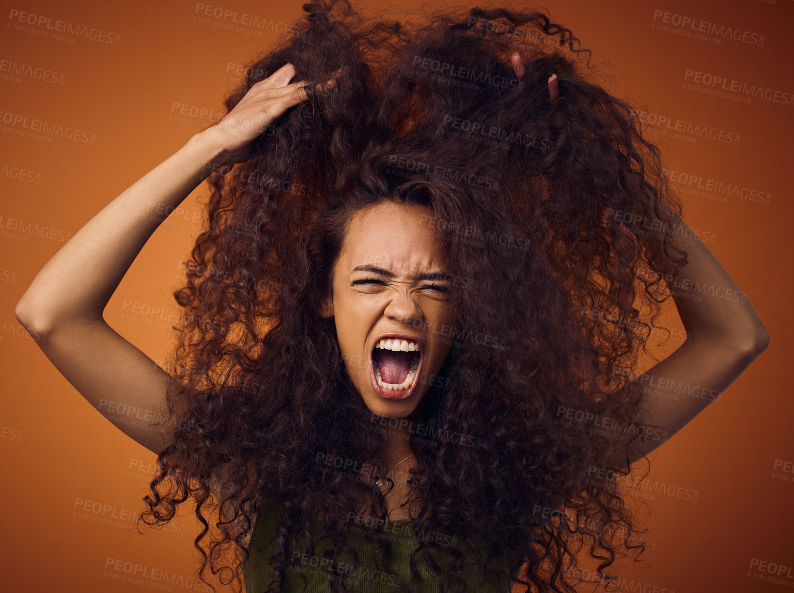 Buy stock photo Woman, hair and angry with damage in studio on brown background for routine, treatment and bad result. Female person, isolated and upset or screaming at curls with stress, unhappy and frustrated