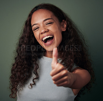 Buy stock photo Happy woman, thumbs up and hand gesture, emoji and agreement with feedback isolated on green background. Yes, like and thank you, excited female person smile, OK sign and support closeup in studio