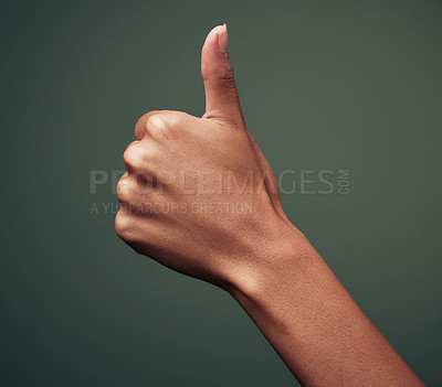 Buy stock photo Thumbs up, hand gesture with emoji and agreement, person with approval and feedback isolated on green background. Yes, like and thank you, mockup space with OK sign and support closeup in studio