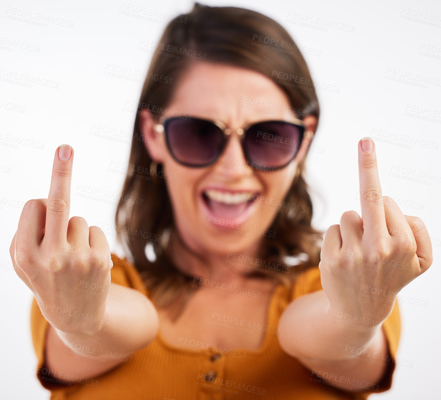 Buy stock photo Woman, portrait and sign with middle finger for expression or flipping off on a white studio background. Face of Female person, young rebel or wild and free in showing emotion, emoji or funny gesture