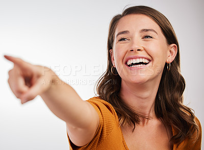 Buy stock photo Happy, woman and hand pointing in studio for news, announcement or deal information on white background. Smile, direction and model show service review, feedback and offer, promotion and results