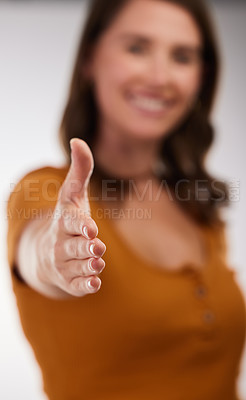 Buy stock photo Welcome, woman and handshake offer in studio blur for job interview, success or contract deal on white background. Thank you, recruitment or hr manager with shaking hands for b2b, crm or hiring into