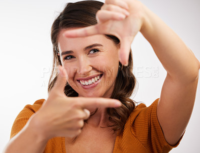 Buy stock photo Selfie, hands and portrait of woman in studio with creative, perspective or shooting on white background. Finger, frame or photographer with profile picture, photography or screenshot, filter or sign