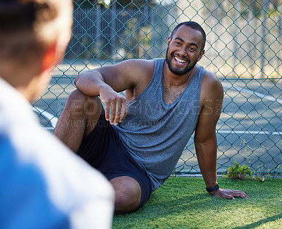 Buy stock photo Happy, fitness and man on a workout break with a friend on grass with conversation and funny joke. Exercise, training and smile of a healthy athlete with trainer relax together with communication