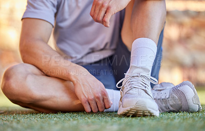 Buy stock photo Running, fitness and shoes of person on grass for cardio workout, marathon training and exercise. Sports, runner and closeup of athlete with sneakers for performance, wellness and rest outdoors