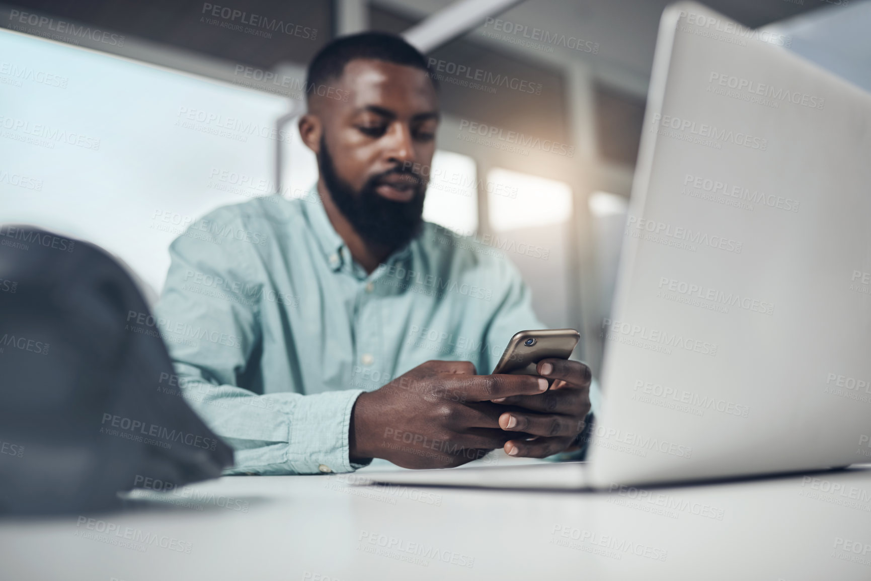 Buy stock photo Business, black man and smartphone with typing, internet and contact with texting or social media. African person, employee or consultant with laptop or cellphone with message, digital app or network