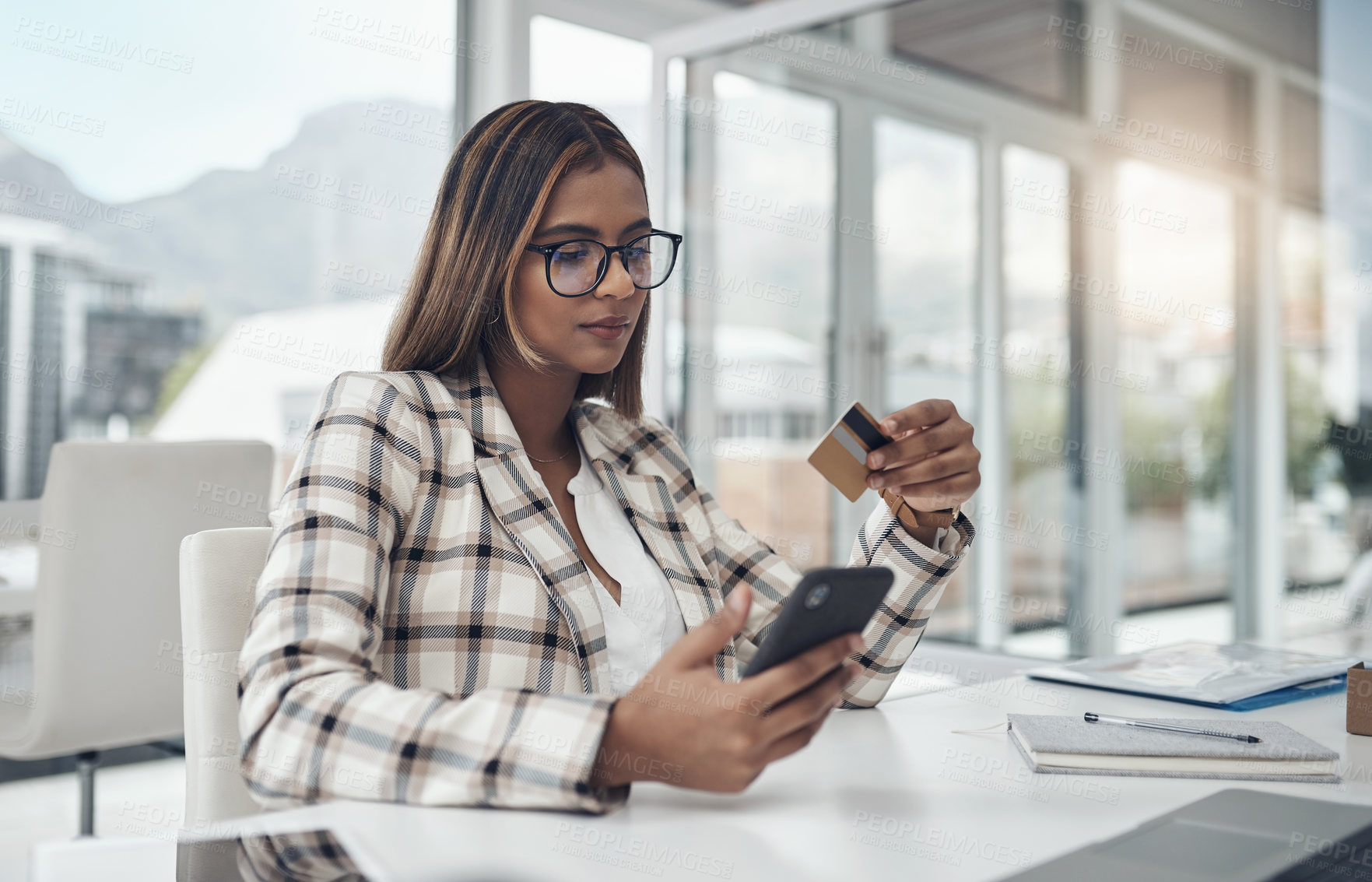 Buy stock photo Business, cellphone and woman with a credit card, online shopping and ecommerce in a modern office. Female person, employee and agent with payment, smartphone and internet connection for transaction