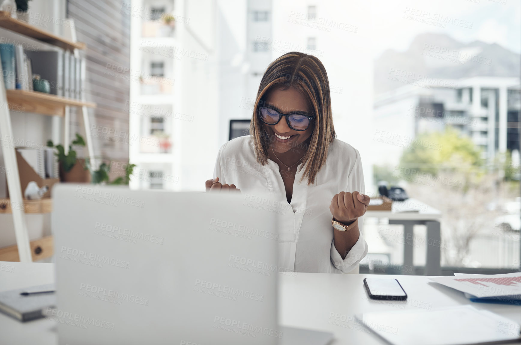 Buy stock photo Business woman, success and laptop to celebrate profit, win or achievement in a modern office. African female entrepreneur at a desk with motivation and technology for bonus, victory and promotion