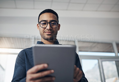 Buy stock photo Email, analysis and a businessman with a tablet at work for connectivity and communication. Internet, reading and a corporate worker with an online app for a professional career as a IT developer