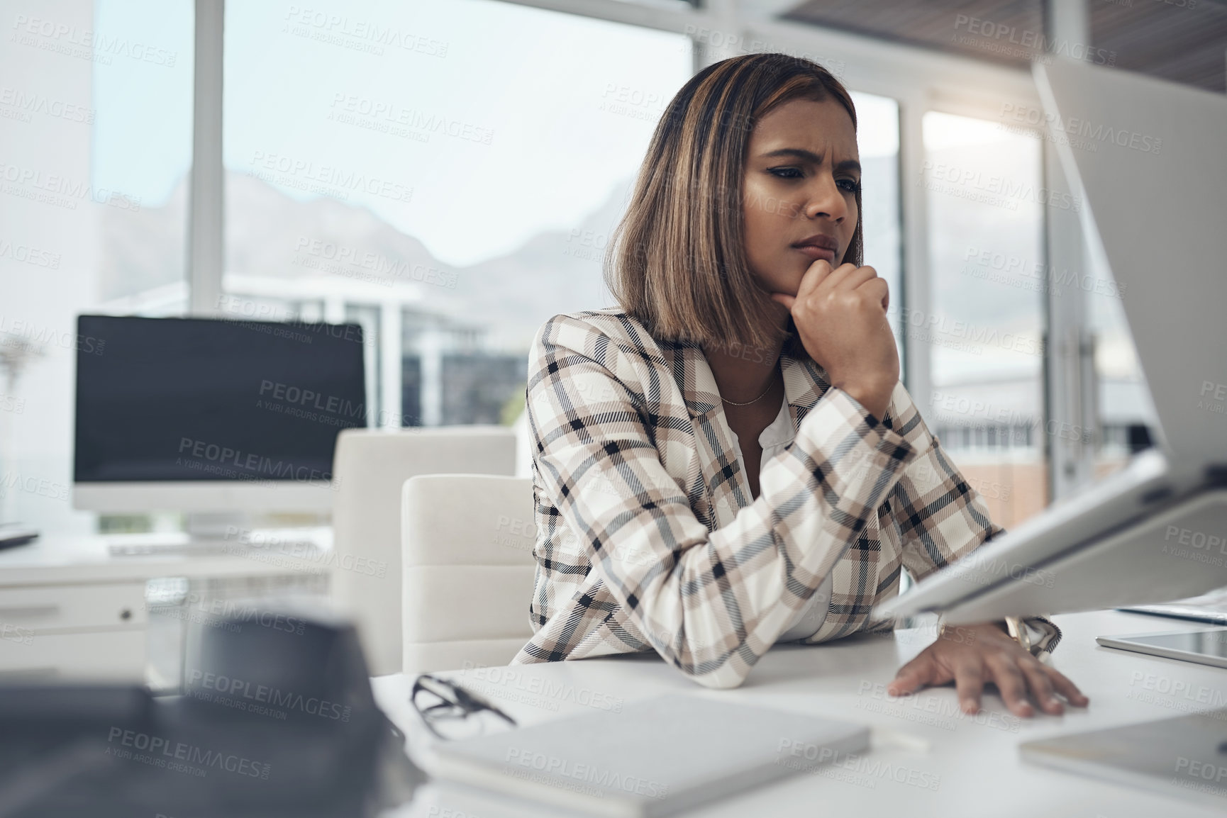 Buy stock photo Thinking, confused and business woman on computer solution, research or serious job decision or planning. Reading, review and doubt or ideas of african person or analyst on laptop for problem solving