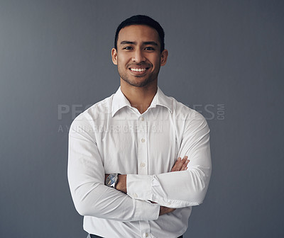 Buy stock photo Portrait, business and Asian man with arms crossed, career and confident guy against a studio background. Face, male person and employee with happiness, startup success and professional with a smile
