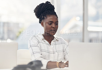 Buy stock photo Professional, woman and working on a laptop for a startup in Africa with information technology. Business, female person and focus on the computer for online search with creative idea for a project.