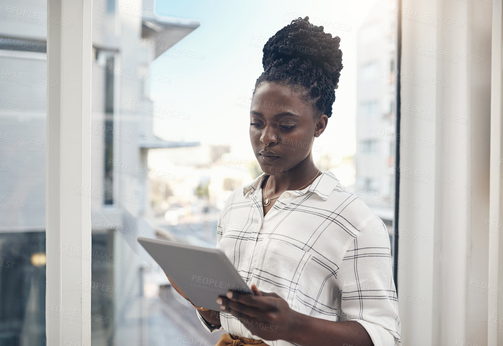 Buy stock photo Business, black woman and tablet with typing, connection or contact with digital app or social media. African person, employee or agent with tech or online reading with research or company website