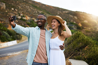 Buy stock photo Road trip, interracial couple and smile for selfie in nature, travel or countryside for vacation in Brazil. Love, people and happy using phone for picture for holiday, journey and drive together