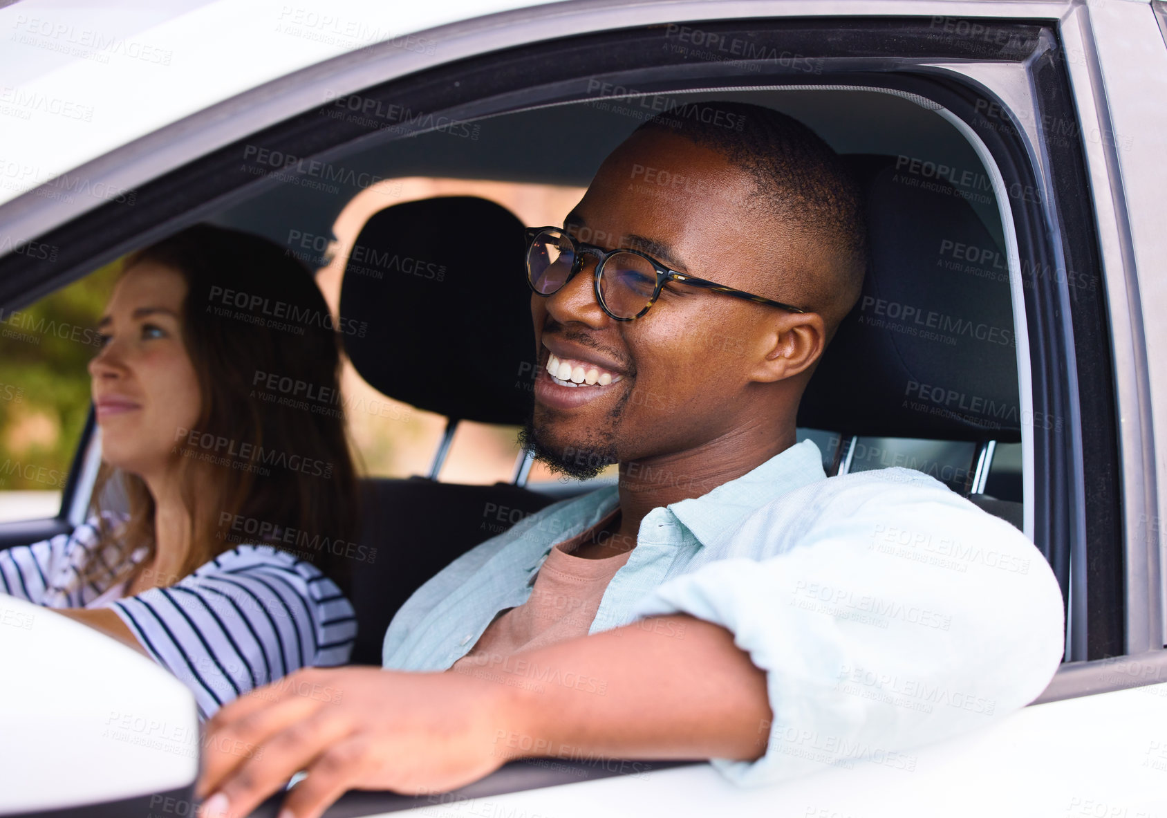 Buy stock photo Couple, car and road trip with window for travel together, holiday journey and happiness. Black man, woman and driving in transport for romantic vacation, relaxing weekend and fun adventure with love