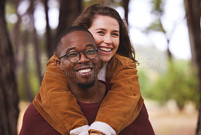 Buy stock photo Love, portrait and couple piggyback in outdoor for camping in wilderness on anniversary date in Norway, countryside. Interracial people, travel and happy on vacation in forest for peace and adventure