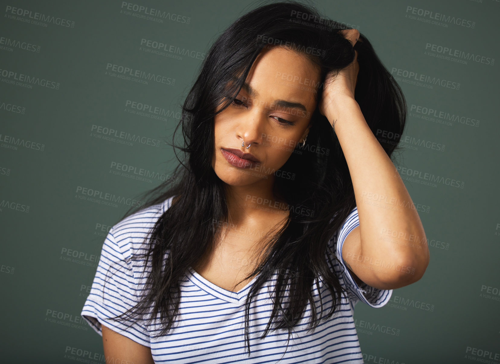 Buy stock photo Stress, girl or thinking of anxiety in studio for burnout or mistake with depression or mental health crisis. Frustrated, hair or sad woman worried by bad news and loss isolated on grey background