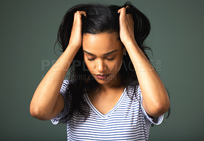 Buy stock photo Stress, pull hair or woman with anxiety in studio for burnout, mistake or mental health crisis in depression. Frustrated, trauma or upset girl worried by bad news and loss isolated on grey background