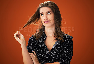 Buy stock photo Studio, unhappy and woman with hair, dry and hairloss with spilt ends, aesthetic and treatment for haircare. Red background, mockup and girl with texture, entangled and matted with cosmetics in salon