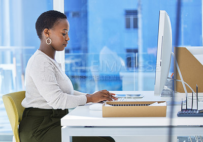 Buy stock photo Computer, typing and black woman in office for creative research with copywriting project. Technology, career and professional African female writer typing email for content on desktop in workplace.