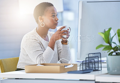 Buy stock photo Coffee, business and black woman in office with drink reading email, report or review at desk. Computer, lens flare and employee with caffeine for online editing, research article or proofreading