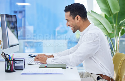 Buy stock photo Computer, smile and typing with business man at desk in office for administration, research or report. Email, internet and technology with happy young employee in workplace for online planning