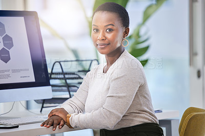 Buy stock photo Portrait, business and confident black woman in office at desk by computer for career or job at startup company in Kenya. Face, professional and African entrepreneur, creative web designer and worker