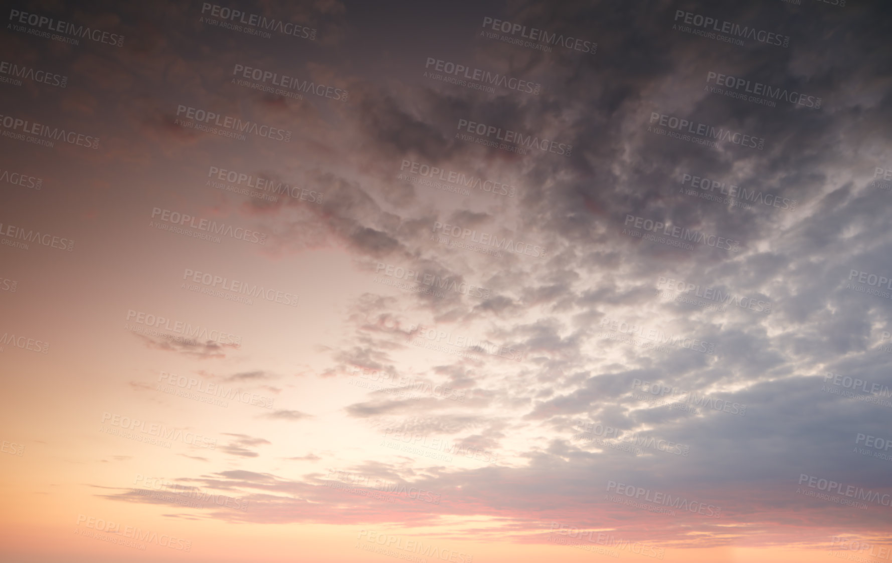 Buy stock photo Dark clouds in a sunset sky background with copy space. Cloudscape climate view of dramatic sky with signs of thunder storm on the horizon. Landscape of the sun at dusk in autumn or winter weather