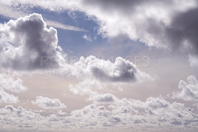 Buy stock photo Beautiful view of cumulus clouds in a blue sky with copy space. Soft cloudscape with fluffy cloud during the day. Puffy white clouds generally symbolize enlightenment, spirituality and heaven