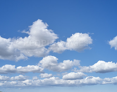Buy stock photo A cloudy sky on a quiet, peaceful morning with copy space. Relaxing view of a soothing sunny day with details of cloudy shapes and patterns. Beautiful cloudscape view of fluffy clouds in a blue sky