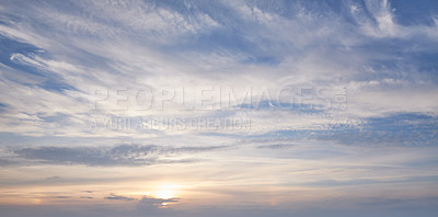 Buy stock photo Copy space with clouds on a sunny day with a blue sky. Quiet atmosphere and peaceful cloudscape wallpaper with sunshine in nature. Beautiful scenery of heaven with cloudy sunset weather outside 