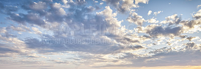 Buy stock photo Cumulus clouds in a blue sky from below. Beautiful panoramic of fluffy, puffy and soft white cloudscape background symbolizing spirituality and heaven. Climate and weather in the atmosphere outside 
