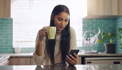 Buy stock photo Reading, phone and woman with coffee in a kitchen relax with social media, app or texting. Smartphone, streaming and female drinking tea in her home on day off, calm and peaceful in her apartment
