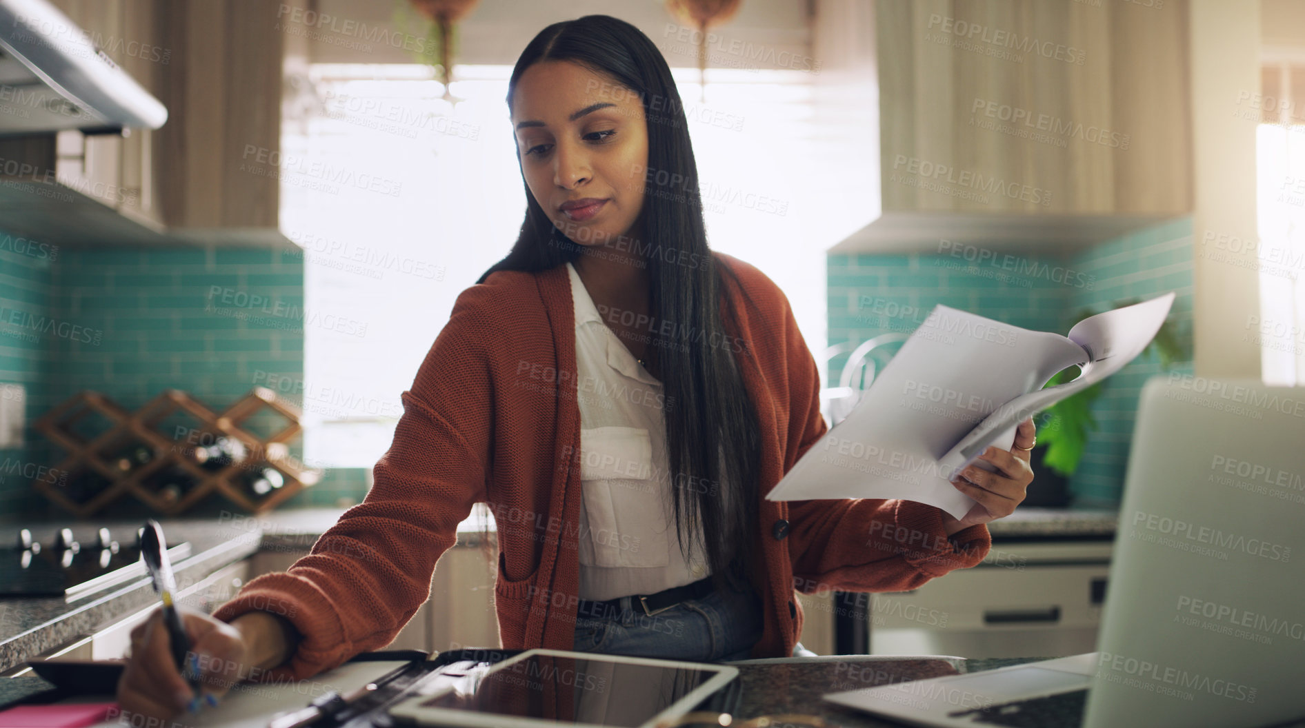 Buy stock photo Woman, writing and remote work paperwork in a kitchen with freelance worker in a home. Working, notes and document of a female person doing freelancer planning on technology for business analyst job