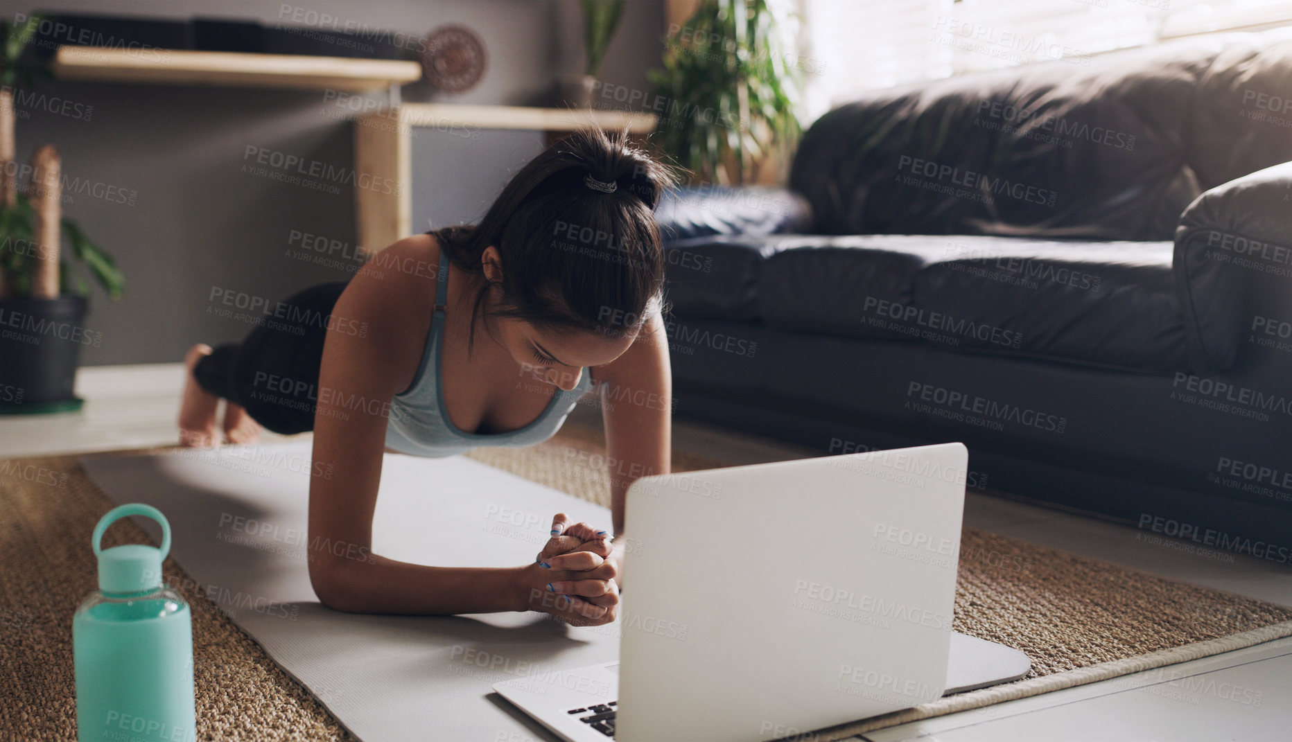 Buy stock photo Pilates, push up and woman with laptop on a floor for exercise, fitness and training in living room. Online, plank and female person in a lounge for cardio, workout and endurance routine in her home