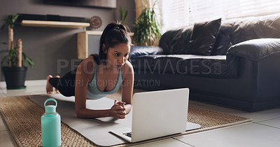 Buy stock photo Pilates, plank and woman with laptop on a floor for exercise, fitness and training in living room. Online, push up and female person in a lounge for cardio, workout and endurance routine in her home