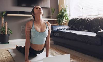 Buy stock photo Yoga, stretching and woman with laptop on a floor for training, fitness and exercise in a living room. Home, workout and female stretch while online for pilates class, wellness or balance in a lounge