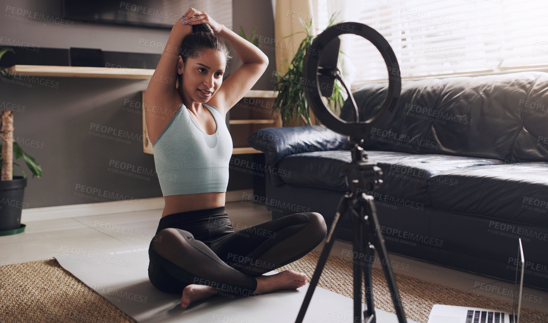 Buy stock photo Live streaming, phone and fitness with woman in living room for social media, workout or yoga teacher. Exercise, internet and stretching with influencer at home for blog, training or wellness vlogger