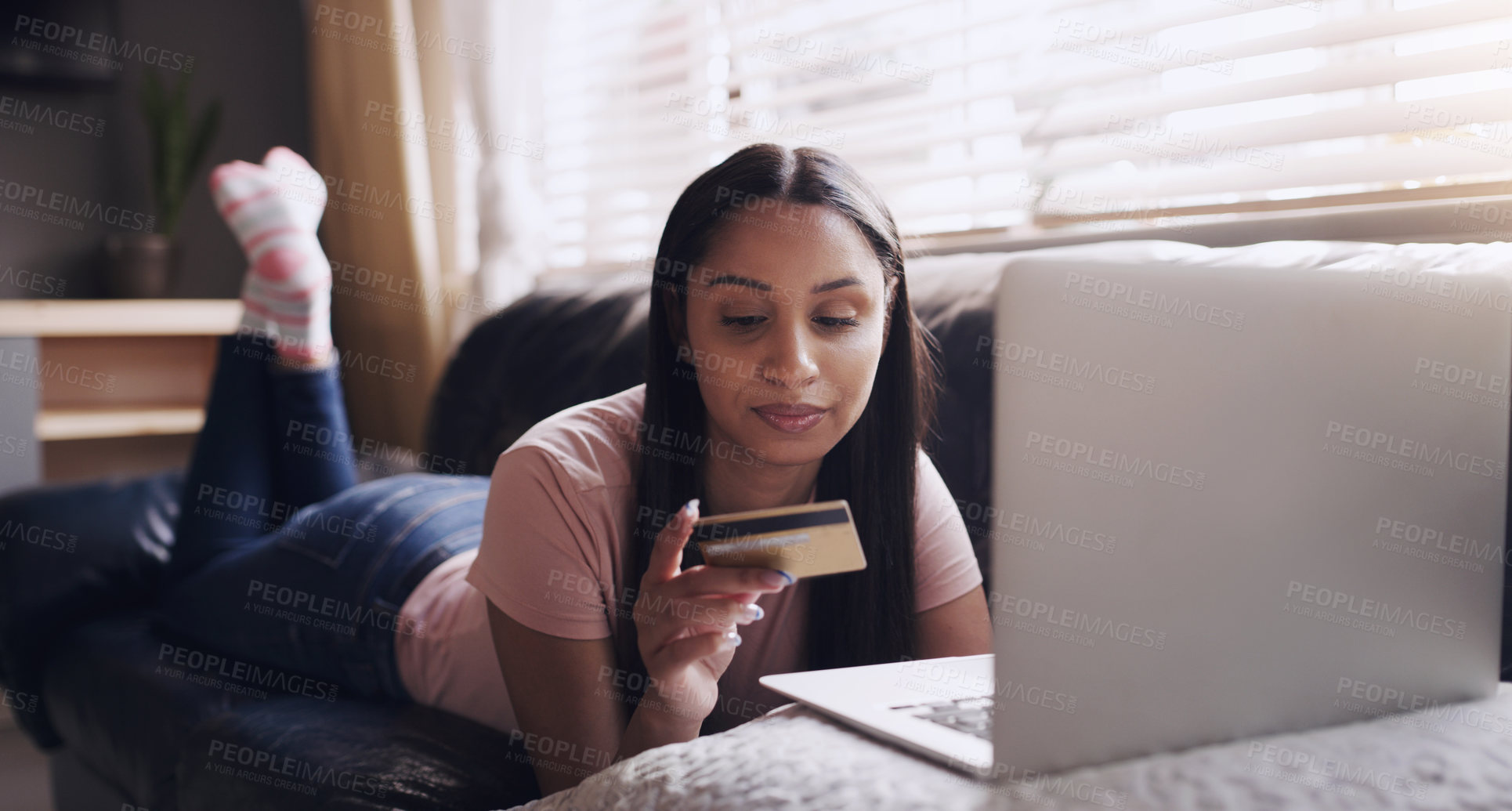 Buy stock photo Credit card, laptop and woman on a sofa for online shopping, ecommerce and payment in her home. Finance, savings and female with computer for loan, banking and membership, subscribe or retail sale