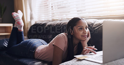 Buy stock photo Laptop, search and woman relax on a sofa with streaming, entertainment and subscription in her home. Online, social media and female person on a couch on day off with film or reading in a living room