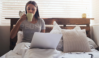 Buy stock photo Bedroom, coffee and woman with laptop for remote work, relax and research for online career. Thinking, reading and freelancer girl in bed with computer checking email, web review and drink in home.
