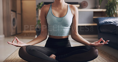 Buy stock photo Shot of an anonymous person practising meditation at home