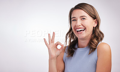 Buy stock photo Okay, agreement and portrait of happy woman in studio mockup with positive attitude. Thank you, smile and girl with ok hand gesture for perfect emoji, yes praise and achievement on white background