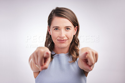 Buy stock photo Hands, portrait and vote with woman pointing at you in studio on gray background with finger. Face, decision and option with gesture of person to show selection for winner of bonus or promotion