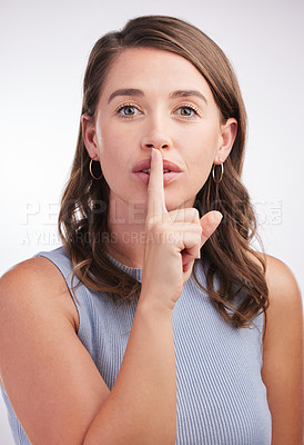 Buy stock photo Woman, studio and portrait or finger on lips, hush and secret  for privacy information or drama with gossip news. Whisper, opinion and quiet with hand gesture for silence, emoji and confidential