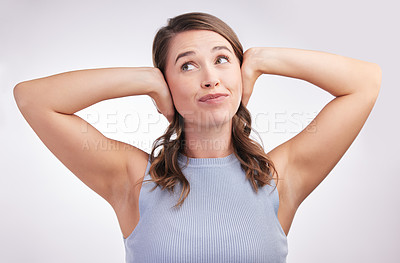 Buy stock photo Noise, woman and cover ears for secret, gossip or thinking of hearing in studio isolated on white background. Sound, block and girl with silence to ignore for relax, peace or calm model not listening