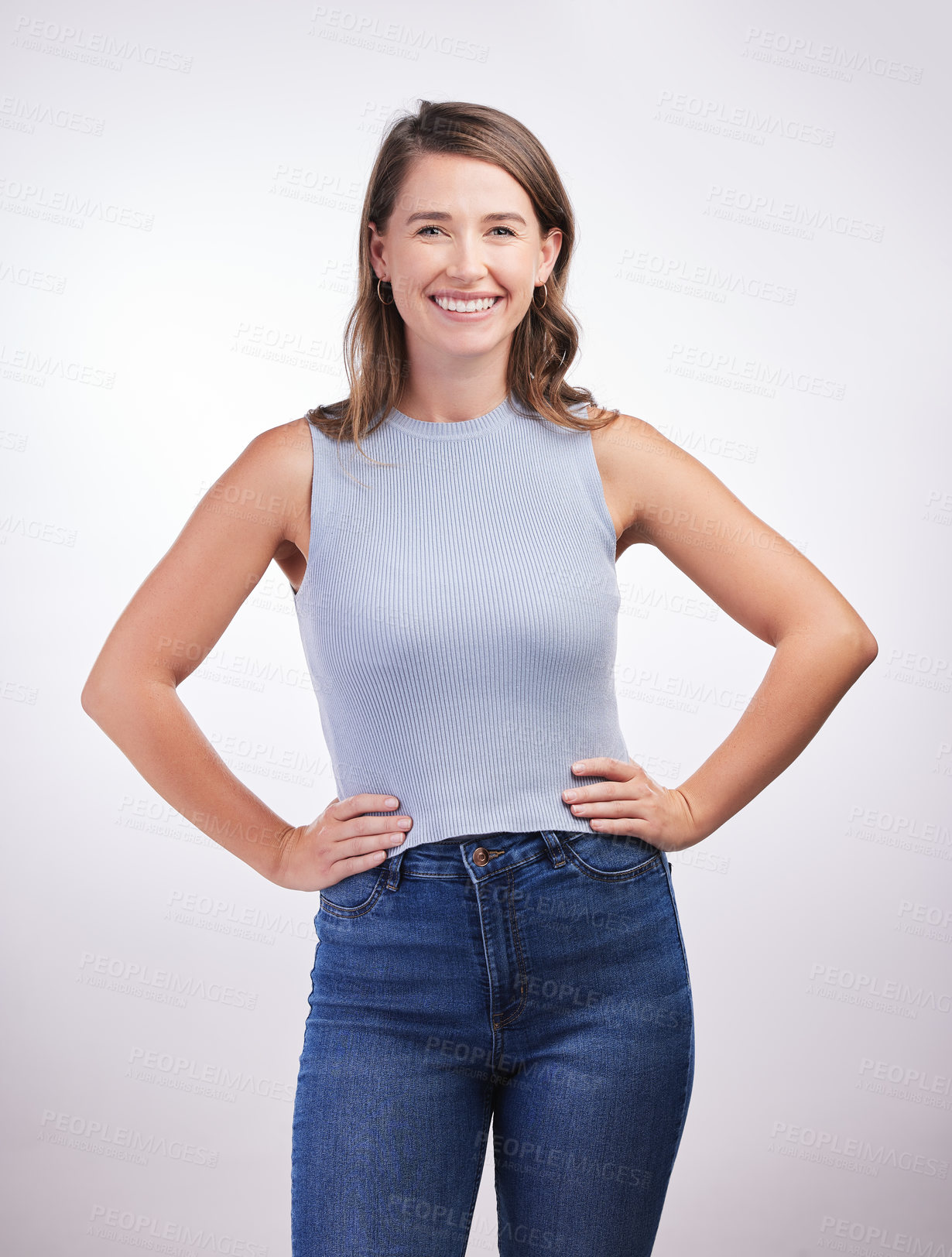 Buy stock photo Confident, fashion model or happy woman in portrait or studio for cool style, trendy jeans or comfortable outfit. Chic, lady and proud person in casual clothing on grey background with smile or joy