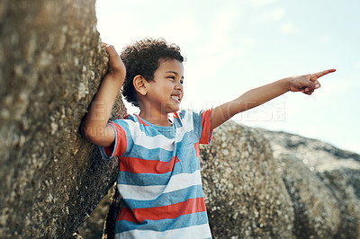 Buy stock photo Shot of a little boy playing on the beach