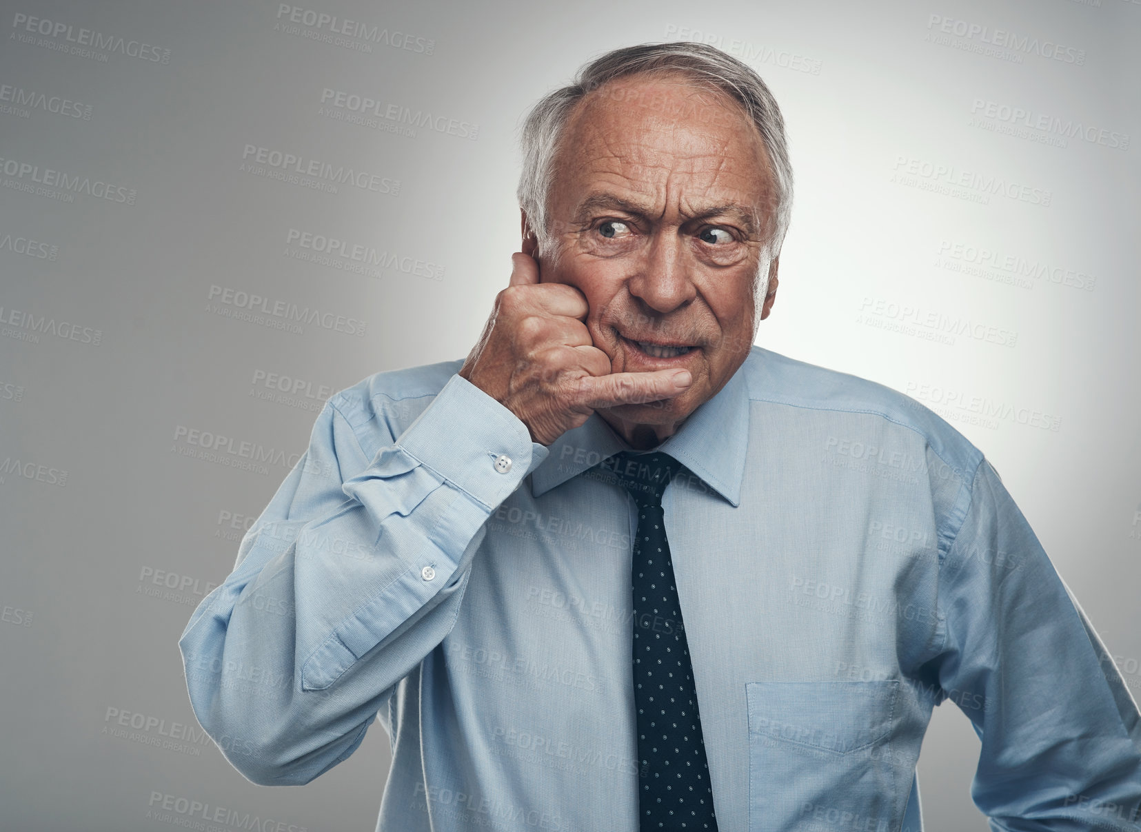 Buy stock photo Stress, man and phone call with hand gesture in studio for market volatility, plummet and bad news. Worry, mature trader and contact emoji on white background for trade loss, disbelief or liquidation