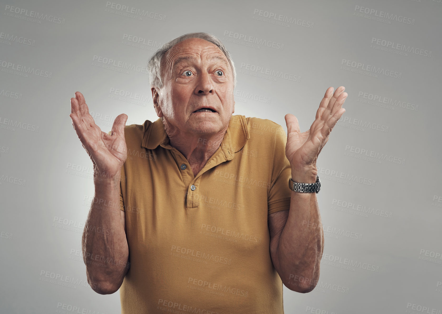 Buy stock photo Studio of an elderly man in disbelief against a grey background